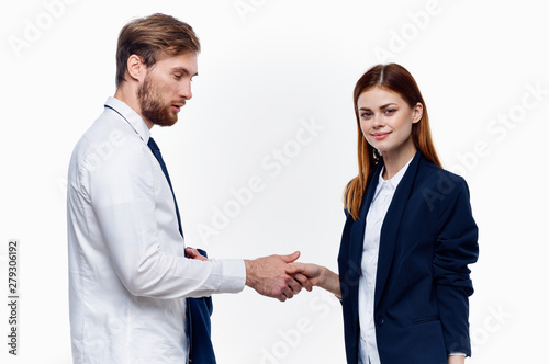 business man and woman shaking hands