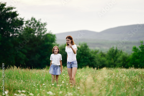 mother and son in field