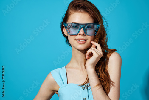 portrait of young woman in sunglasses