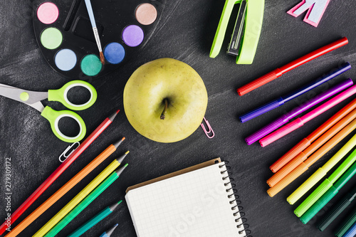 Composition with apple and stationery
