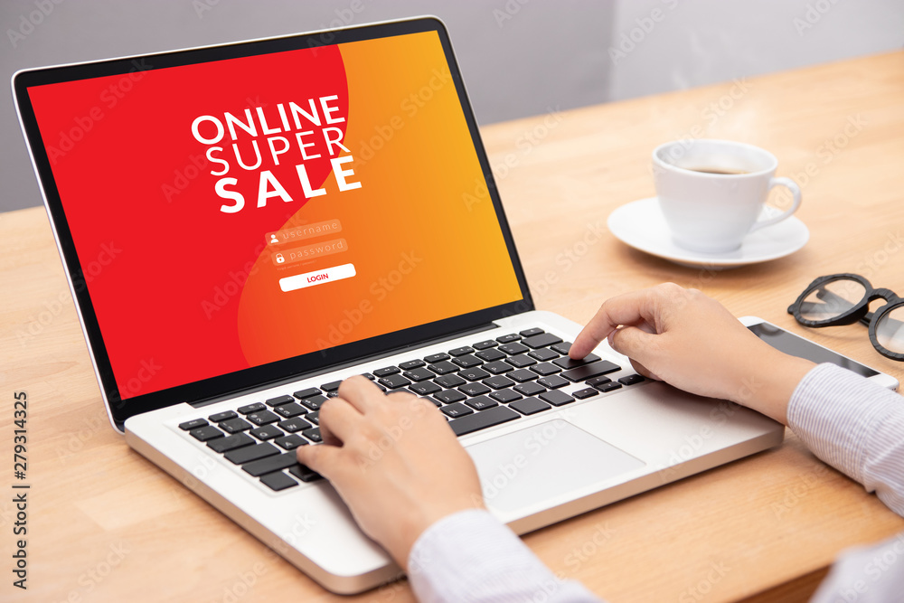 woman login with password on laptop computer for shopping online website with promotion sale discount campaign on screen woman login with password on laptop computer for shopping online website with promotion sale discount campaign on screen