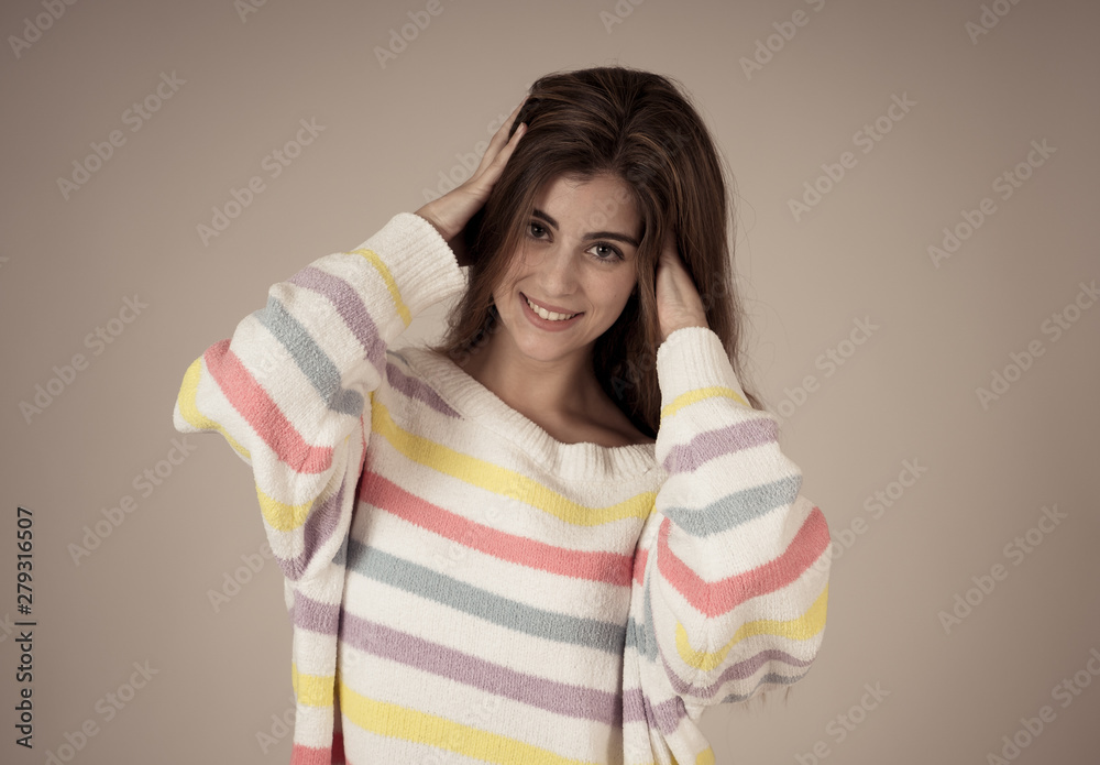 Portrait of an attractive girl with happy and smiling face. In beauty, model and fashion concept Portrait of an attractive girl with happy and smiling face. In beauty, model and fashion concept