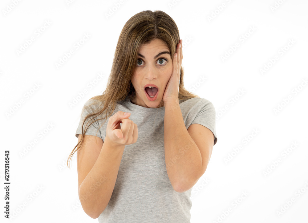 Happy young attractive woman shocked with a surprised funny face. Human expressions and emotions. Happy young attractive woman shocked with a surprised funny face. Human expressions and emotions.