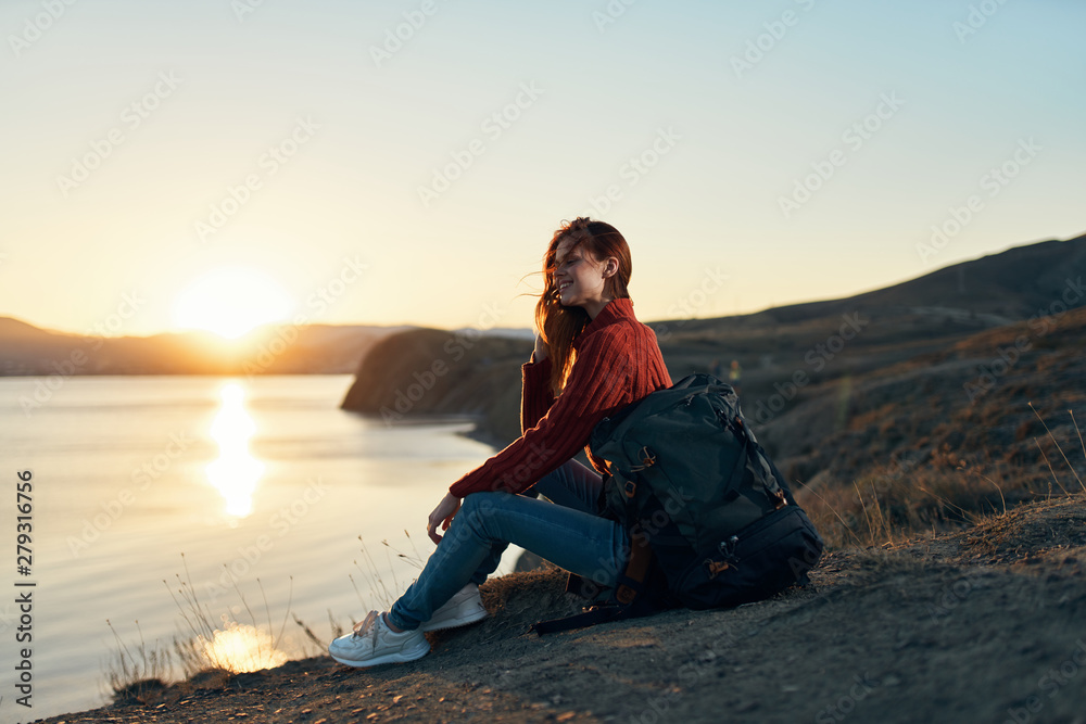 woman sitting on the beach