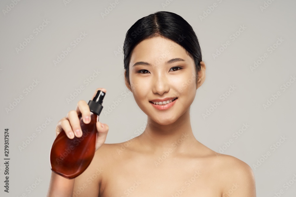 portrait of a young beautiful woman with perfect skin portrait of a young beautiful woman with perfect skin