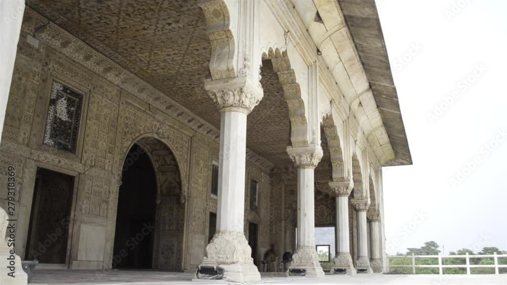 Guard sitting at beautiful ancient white marble interiors architectures of red fort delhi Guard sitting at beautiful ancient white marble interiors architectures of red fort delhi