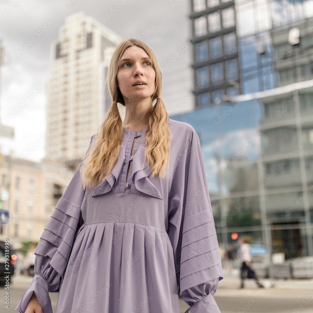 Fototapeta premium young woman in the city