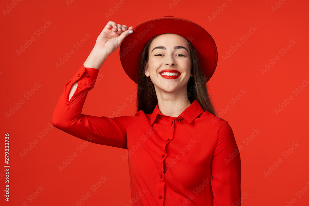 young woman in a red hat young woman in a red hat