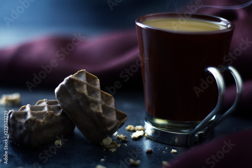 Two pieces of chocolate and a warm drink © Petteri