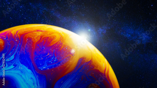 Colorful planet in deep space photo