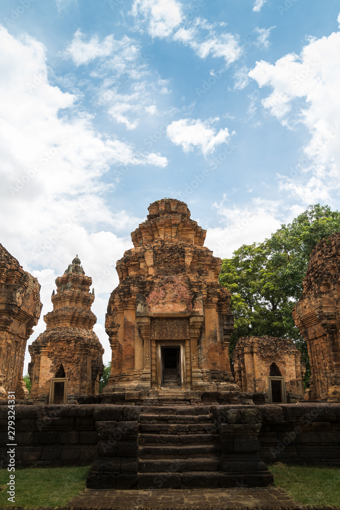 Khmer Castle in Thailand Made of large brown-orange stones arranged together and carved into beautiful architecture.(Prasat Sikhoraphum, Surin, Thailand)