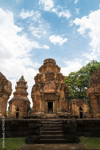 Khmer Castle in Thailand Made of large brown-orange stones arranged together and carved into beautiful architecture. Prasat Sikhoraphum  Surin  Thailand 