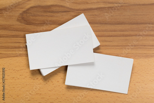 Mockup of business cards stack at wooden background. Design concept. Template for branding identity.