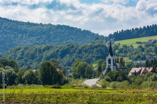 countryside road and old traditional church