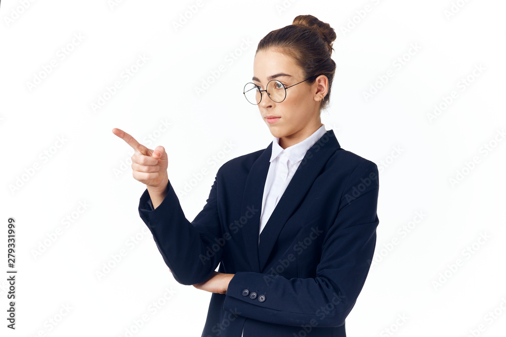 business woman with glasses pointing to a free place