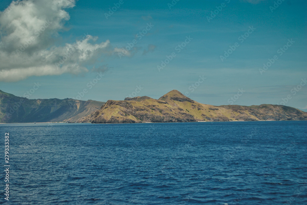 Beautiful island beach. View of tropical beach with blue sky In Labuan Bajo, Indonesia.