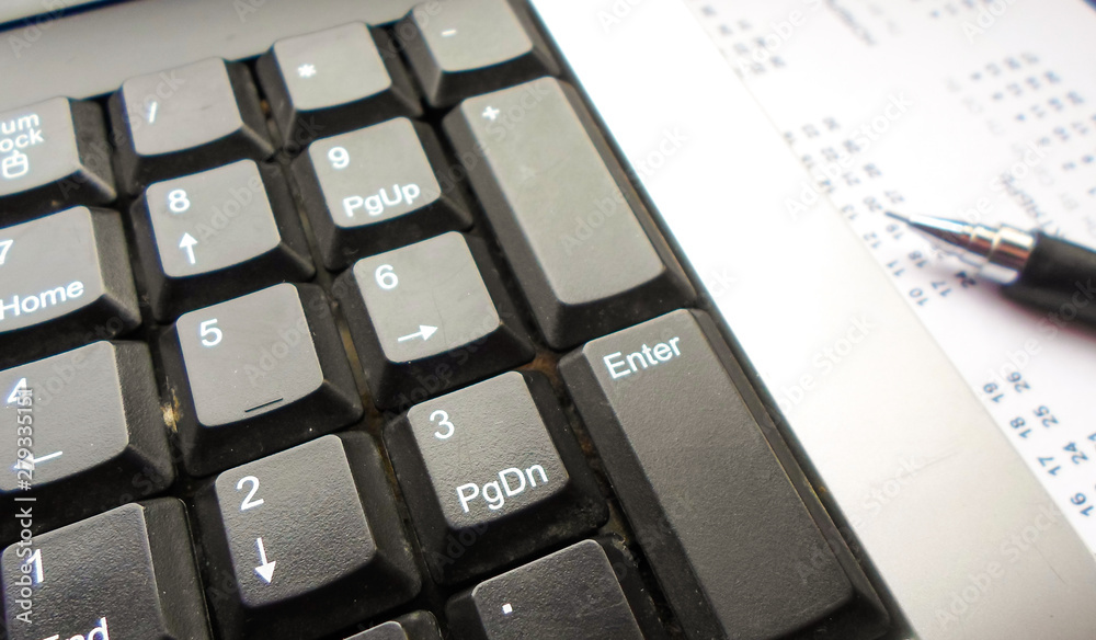 keyboard, pen and calendar on the table. workplace keyboard, pen and calendar on the table. workplace