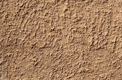 Beige color grungy cement wall texture.