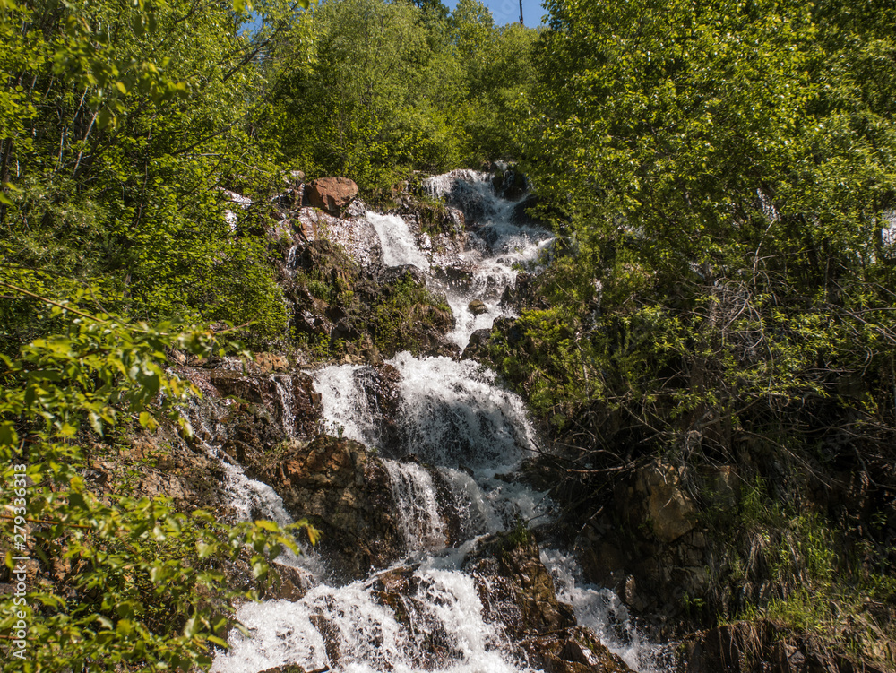 waterfall with splashes and rocks waterfall with splashes and rocks