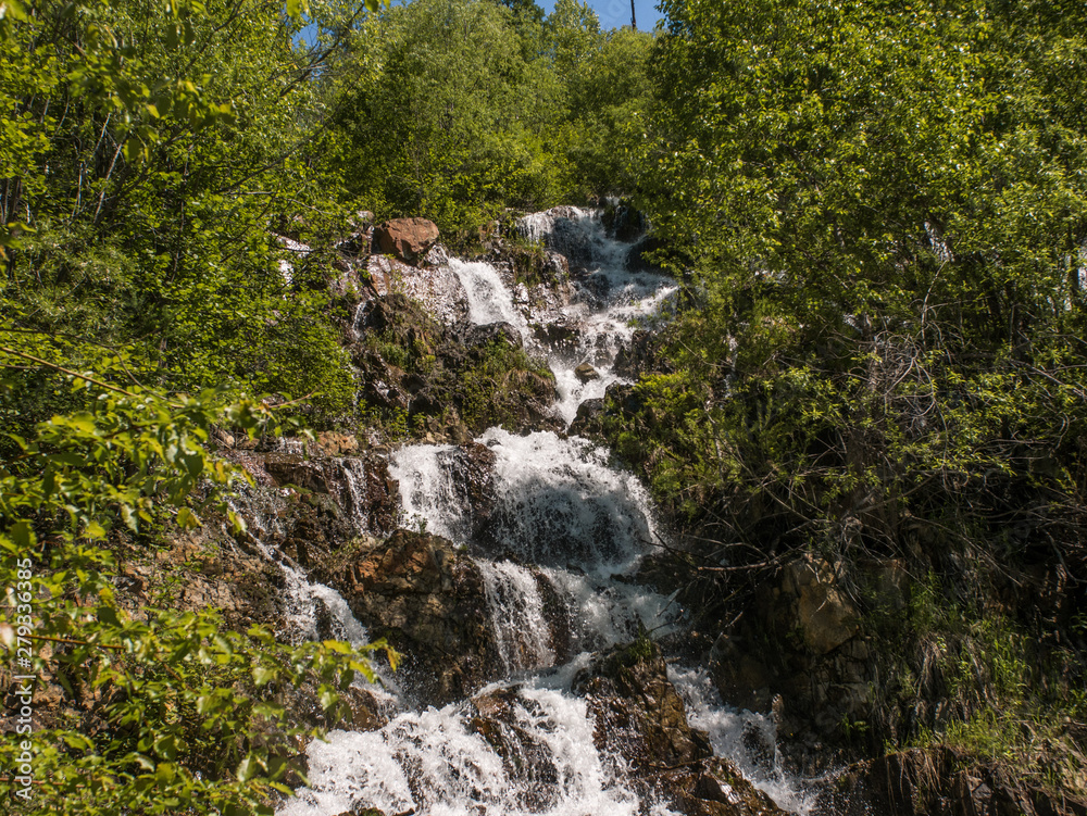 waterfall with splashes and rocks waterfall with splashes and rocks