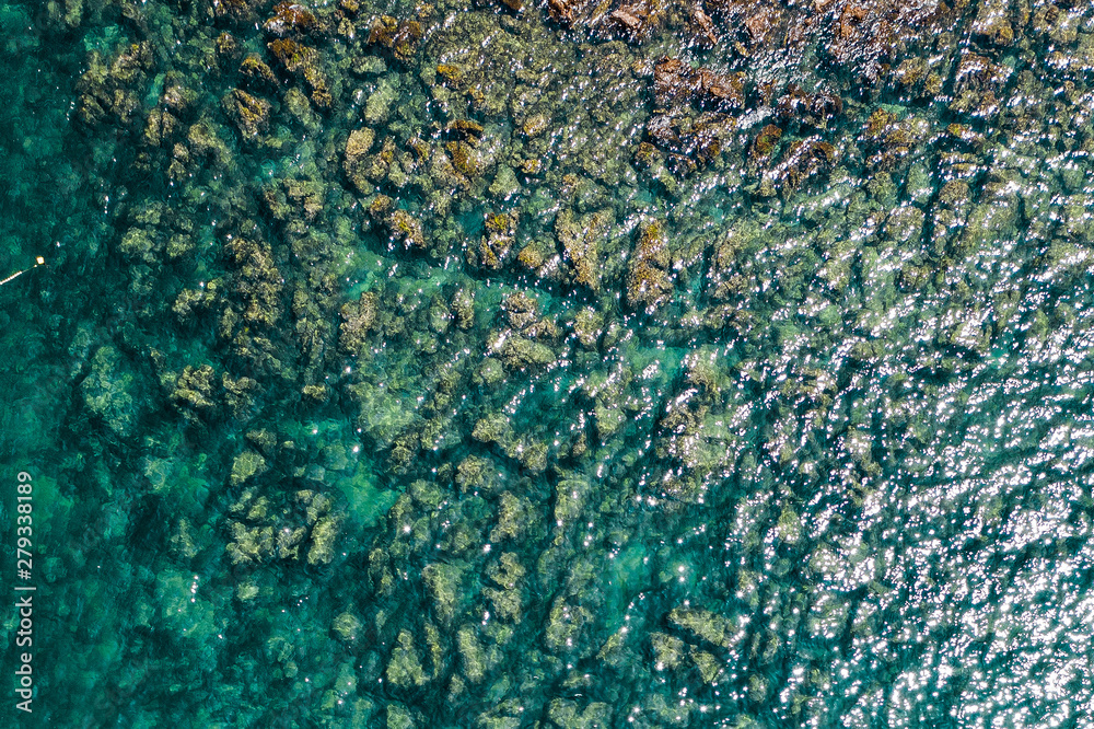 Aerial view of rocky seaside. Rocky stones in the ocean. Aerial photography of beautiful rocky seashore. Aerial view of rocky seaside. Rocky stones in the ocean. Aerial photography of beautiful rocky seashore.