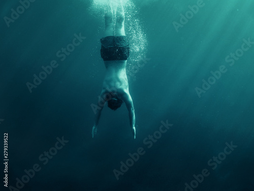 Canvas Print Man jumping into the water