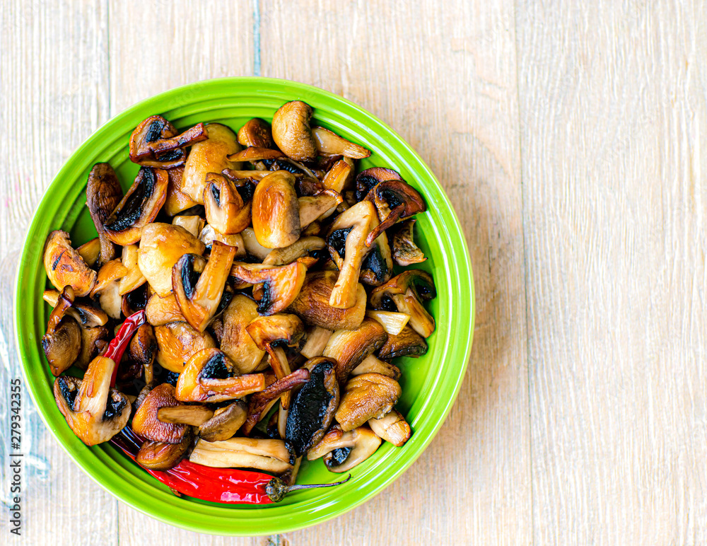 Fried mushrooms with chilli and seasonings. Fried mushrooms with chilli and seasonings.