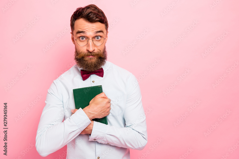 Photo of interested wearing eyeglasses specs weird loony mad of reading hipster having hobby holding green book cover in hands isolated pastel background Photo of interested wearing eyeglasses specs weird loony mad of reading hipster having hobby holding green book cover in hands isolated pastel background