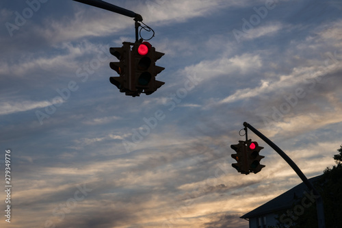 Traffic light with green light against the evening sky in USA.  Selective focus.