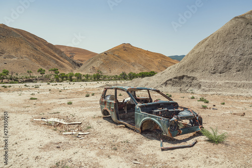 Old abandoned car in the desert