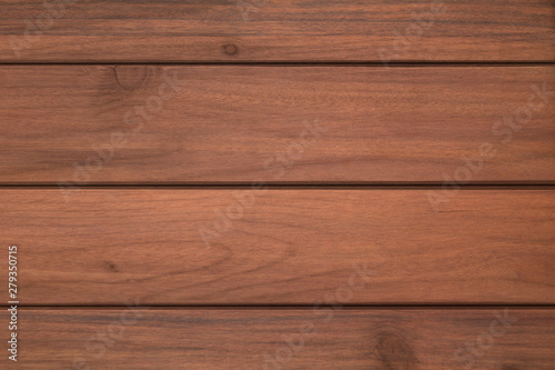 Texture of dark wood plank can be use for background. The dark wood background is on top view of natural wooden from the forest show texture of original wooden.