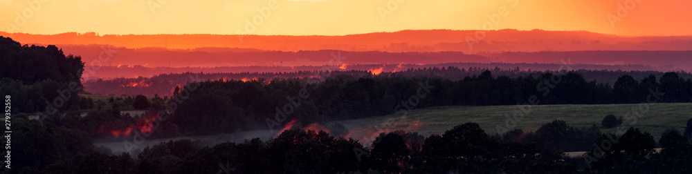 Red hot sunset summer evening panorama