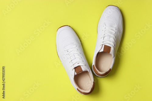Wallpaper Mural men's sneakers on a colored background top view. men's footwear. minimalism Torontodigital.ca