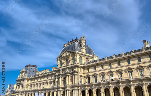 Paris, France - April 21, 2019 - A view of the Louvre Museum, the world's largest art museum and a historic monument in Paris, France, on a sunny day.