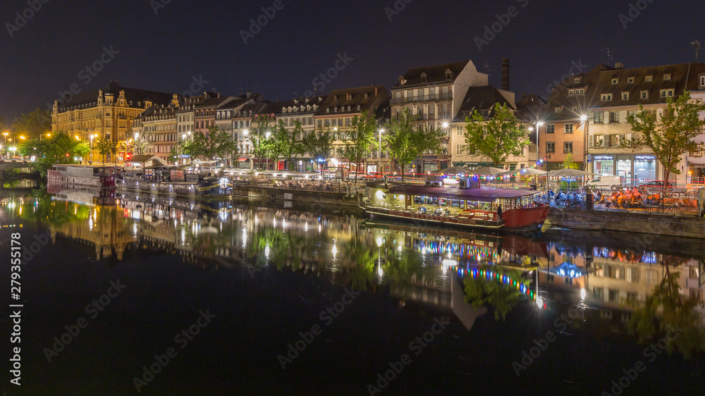 Reflexion in docks in Strasbourg by night