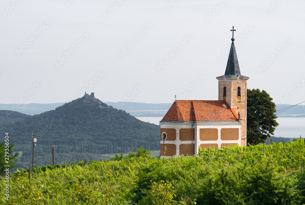 Lengyel-Chapel and the Castle of Szigliget seen from the village of Hegymagas, situated on Saint George Hill near Lake Balaton, Hungary. Lengyel-Chapel and the Castle of Szigliget seen from the village of Hegymagas, situated on Saint George Hill near Lake Balaton, Hungary.