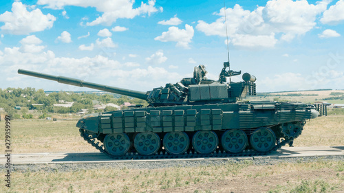 Tank in the field. The armored combat vehicle.