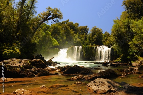 Waterfall at Huerquehue and Puyehue National Park, Pucon - Chile. Patagonian waterfall with rainforest wild plants. photo