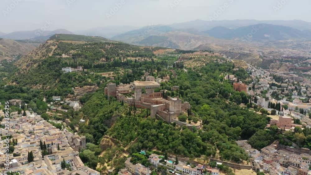 Aerial view of cityscape of Granada, famous European historic city in summer, monumental castle/palace complex of Alhambra - landscape panorama of Andalusia from above, Spain, Europe Aerial view of cityscape of Granada, famous European historic city in summer, monumental castle/palace complex of Alhambra - landscape panorama of Andalusia from above, Spain, Europe