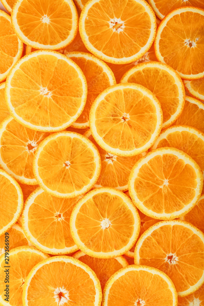 Round orange slices, in the form of texture and lanterns of fresh juicy slices Round orange slices, in the form of texture and lanterns of fresh juicy slices