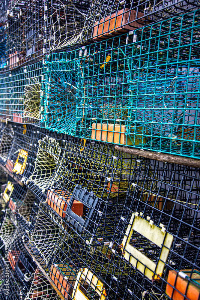 Wall of stacked lobster traps in Maine, USA