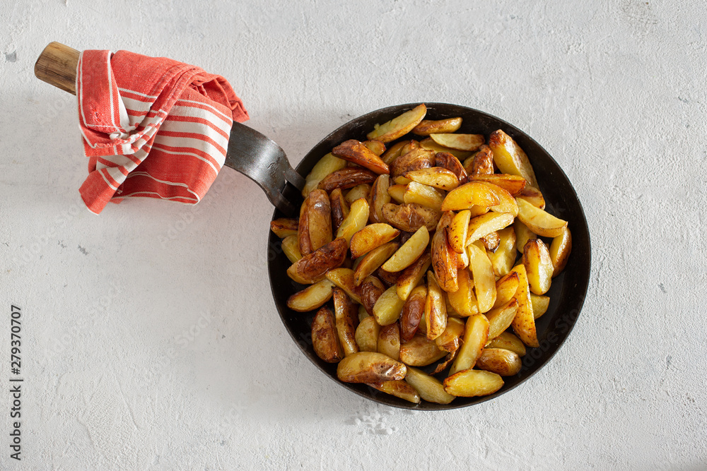 Fried potatoes with brava sauce on a white background top view Fried potatoes with brava sauce on a white background top view
