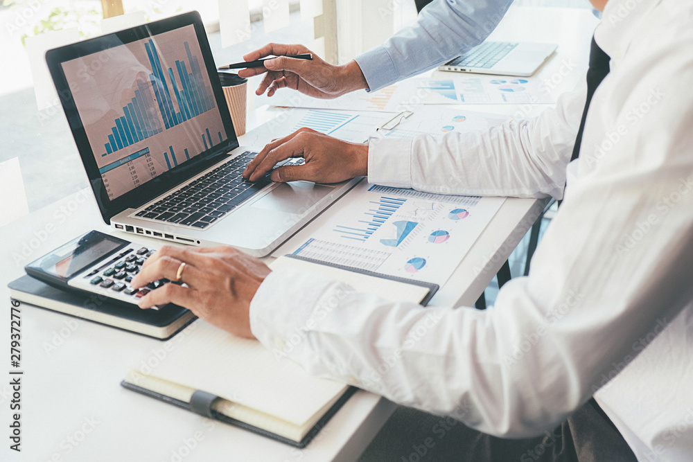 Administrator business man financial inspector and secretary making report calculating balance. Internal Revenue Service checking document. Audit concept