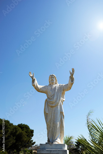 Cristo Redentor statue  Christ the Redeemer Statue . Similar to the statue in Rio de janeiro. Concept of forgiveness. Father who forgives his son.