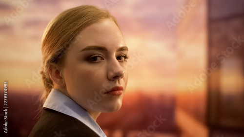 Portrait of self-confident businesswoman looking decisively on camera, careerist