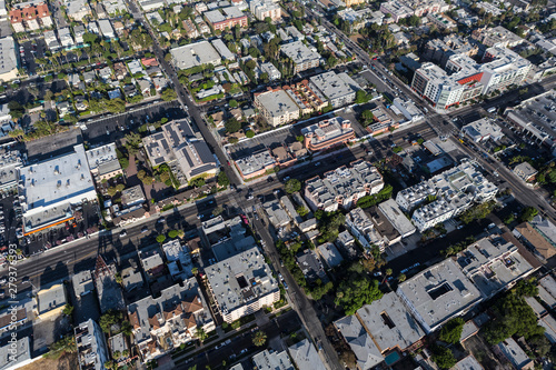 Aerial of apartments and commercial buildings along La Brea Ave in the Hollywood neighborhood of Los Angeles, California.  