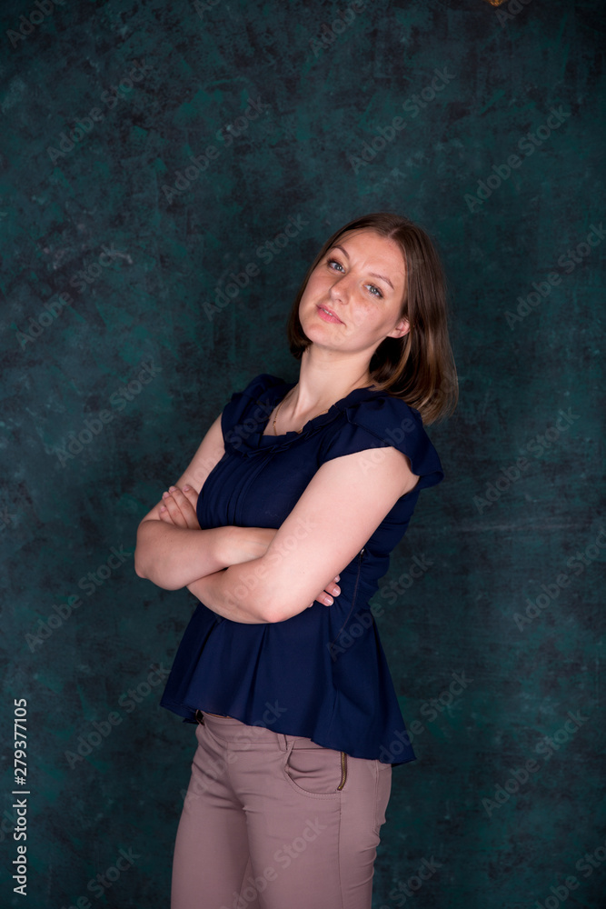 Portrait of Beautiful Young Woman in Studio