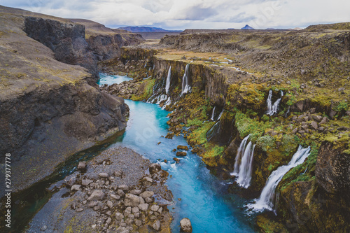 Aerial view of Sigˆldugljufur, in the Icelandic Highlands, in Iceland. Off the beaten path, this incredible set of waterfalls is hiding in plain sight.