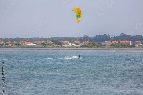 View of a professional male kitesurf sports practicing extreme sports Kiteboarding