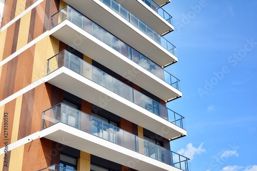 Multistory new modern apartment building. Stylish living block of flats.